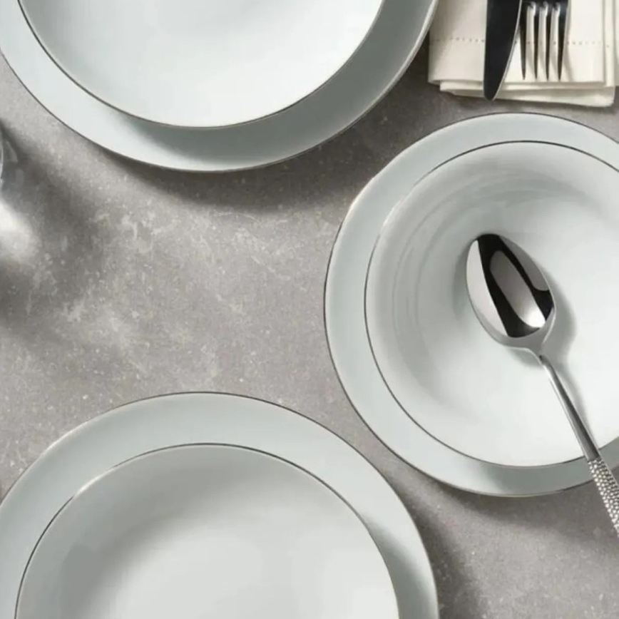 8-delars matservis i porslin, vit med silverdetaljer