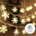 Aigostar - LED Julbelysning 20xLED/3xAA 3,3m snöflingor