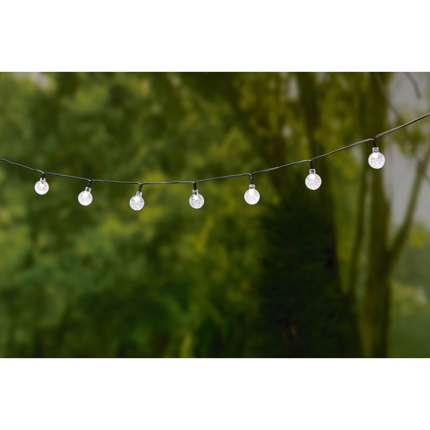 Grundig - LED solcellsljusslinga 50xLED/8 funktioner 6,9m varm vit