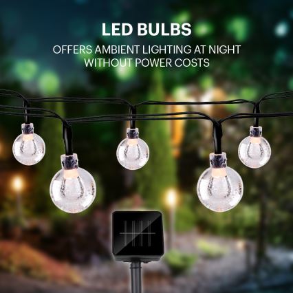 Grundig - LED solcellsljusslinga 50xLED/8 funktioner 6,9m varm vit