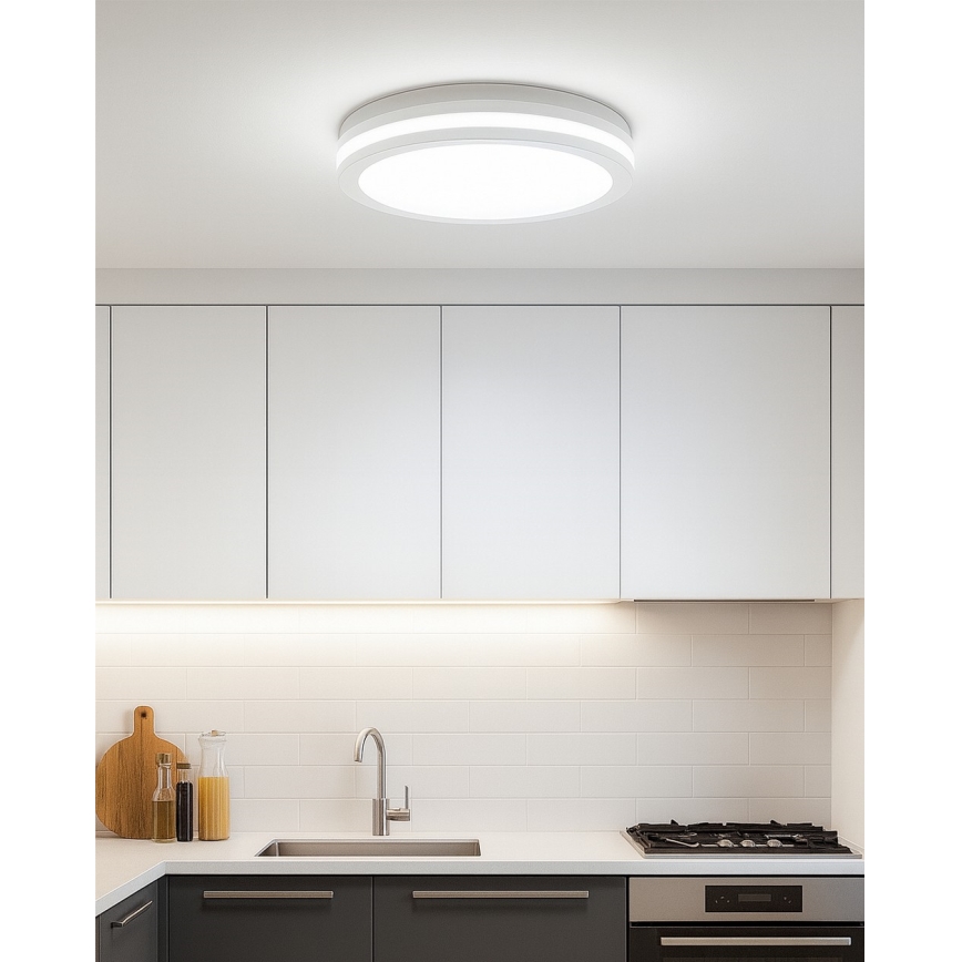 LED taklampa för badrum med rörelsesensor LED/20W/230V 3000/4000/6500K Ø 23 cm IP54 vit