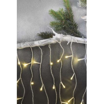 LED utomhus julkedja  300xLED/8 funktioner 10m IP44 varm vit  + fjärrkontroll 