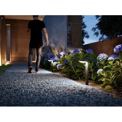 Philips - LED-lampa för utomhusbruk med en sensor LED/9W/230V 4000K IP44