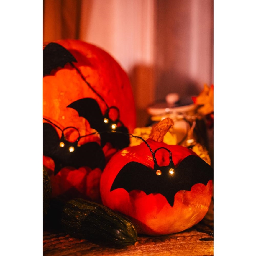 LED dekorativ kedja HALLOWEEN 10xLED/2xAA/varm vit 1,3m fladdermöss