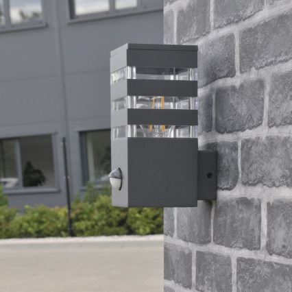 Utomhus vägglampa med sensor TEKSAS 1xE27/12W/230V IP44 antracit