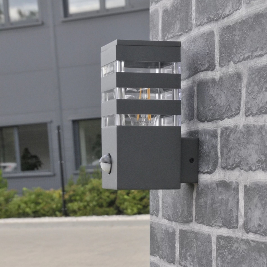 Utomhus vägglampa med sensor TEKSAS 1xE27/12W/230V IP44 antracit