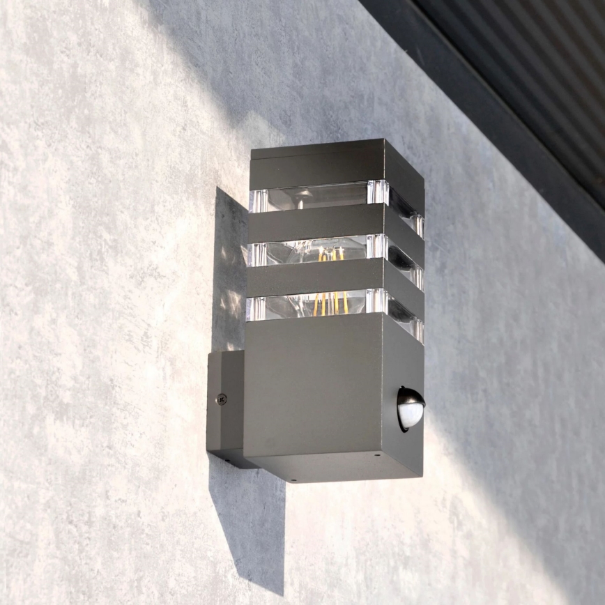 Utomhus vägglampa med sensor TEKSAS 1xE27/12W/230V IP44 antracit